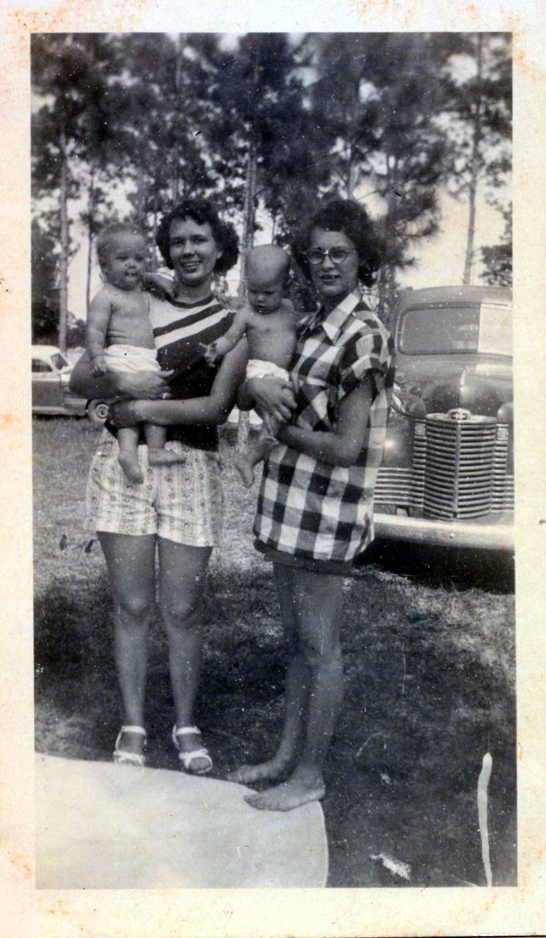 Barbara holding Brenda, Betty holding Janice