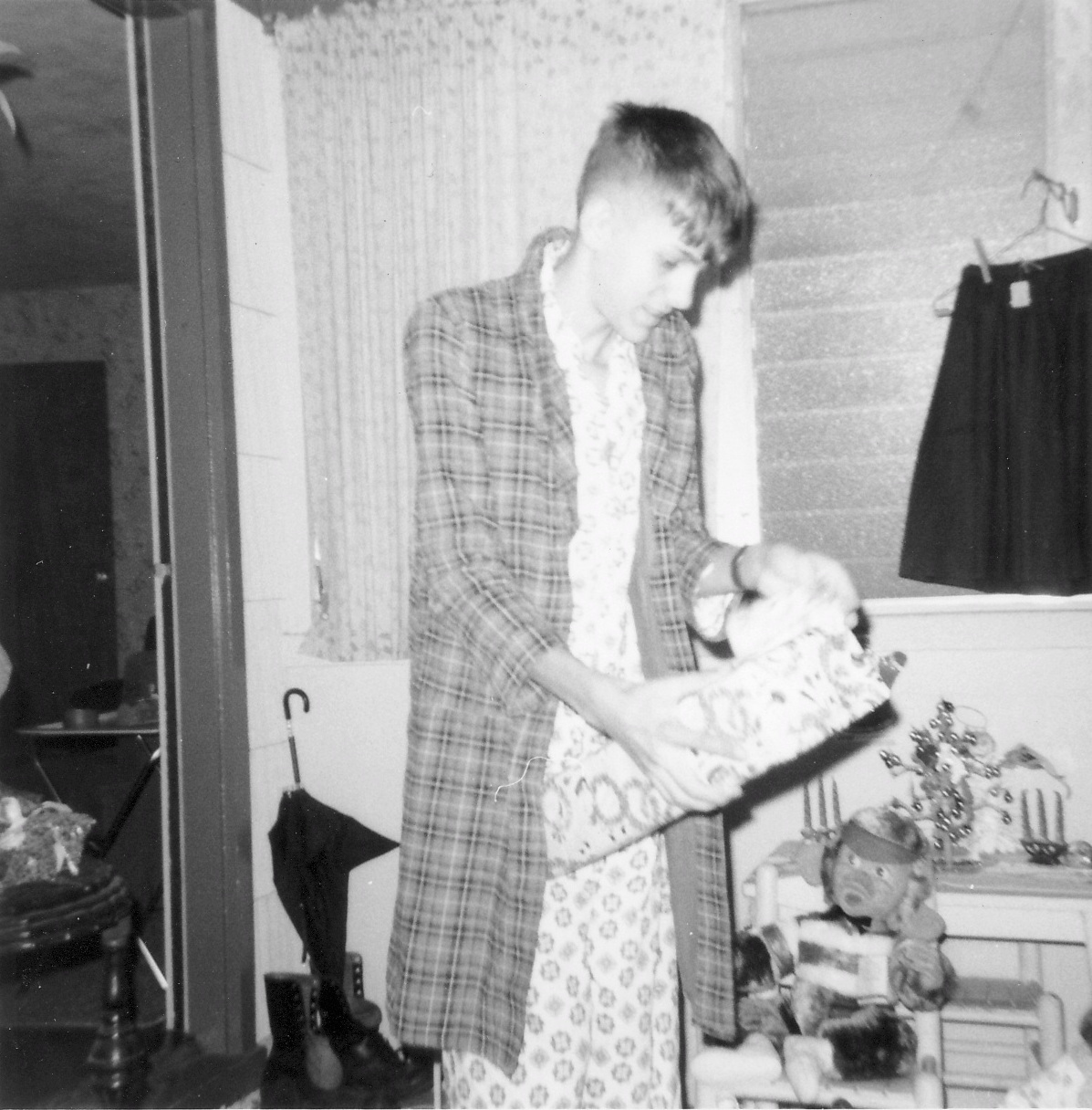 Larry opening present Christmas