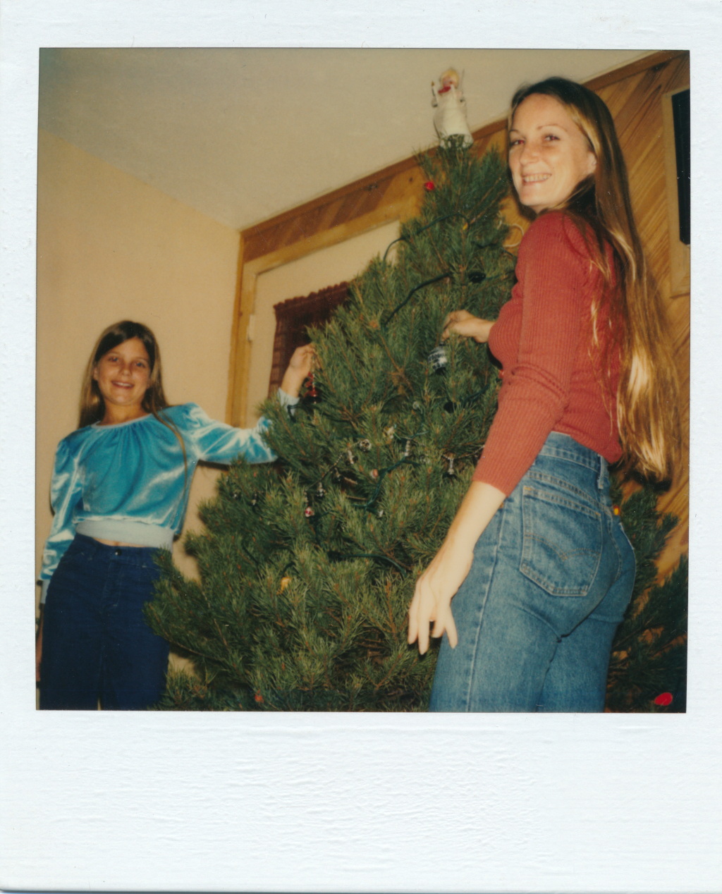 Julie and Anne decorating Christmas tree