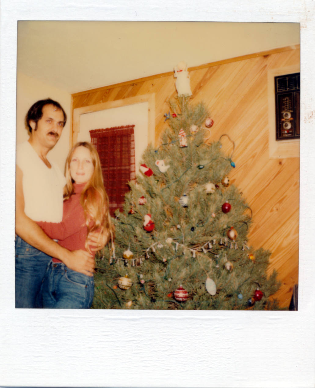 Jule and Larry by Christmas tree