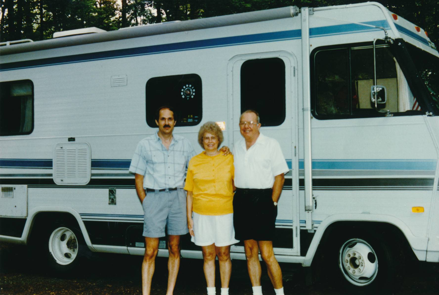 Larry with Mom and Dad and motor home