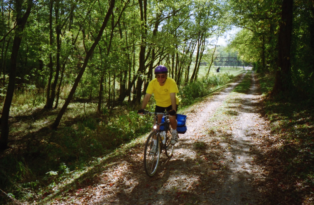 The tow path is very scenic often under the shade of overhanging trees, here is Dennis next to a portion of the canal that had no water.