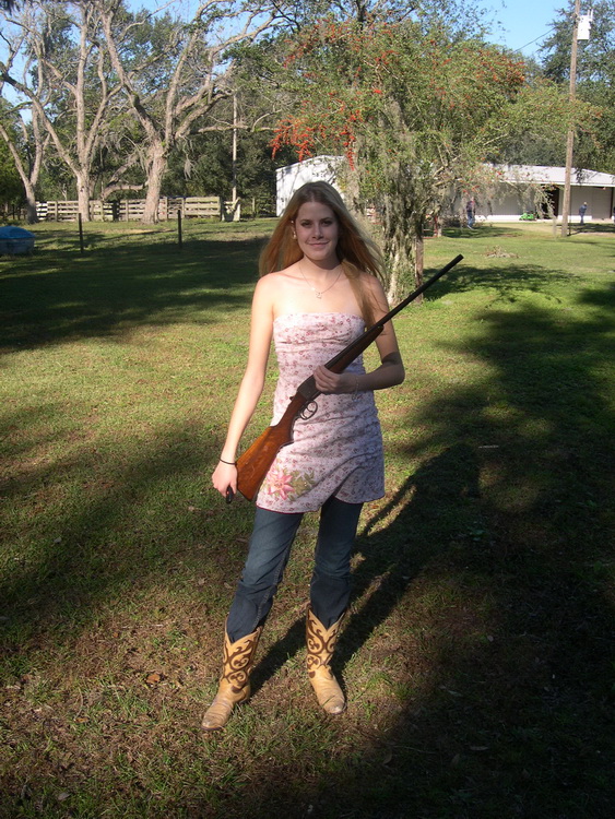  "Annie Oakly"<br>Neice Coral with Dad's 4-10 shotgun